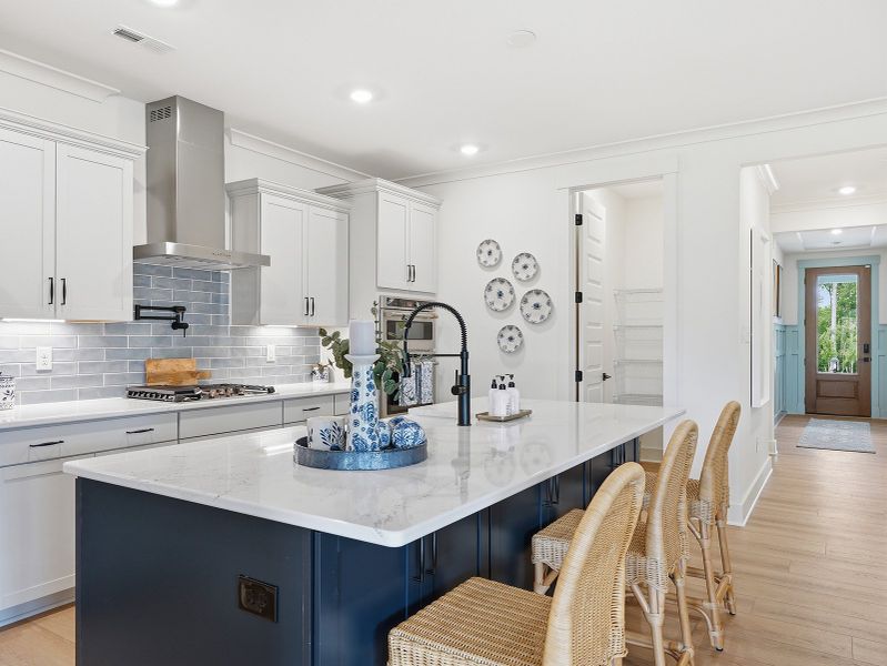 Representative furnished interior of a home built from the Goodwin - Vanguard Collection by Mungo Homes in Grand Park, Leland (Image 3).
