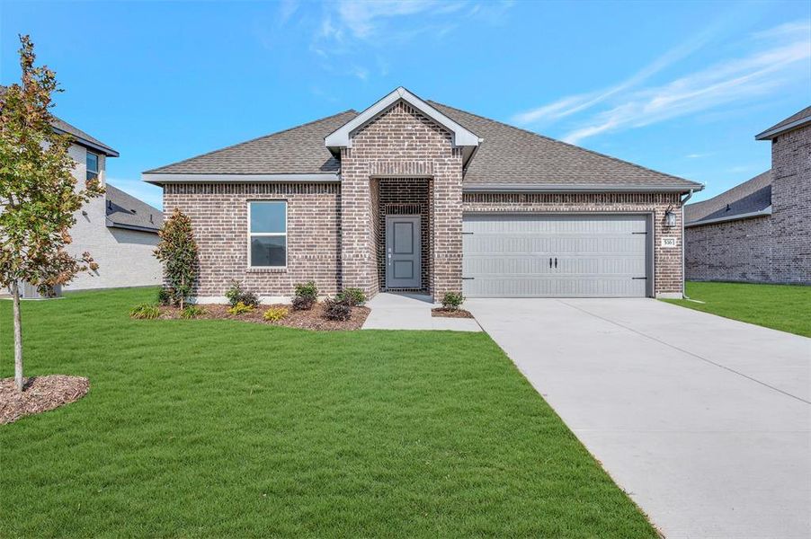 Front exterior of a new home in Rolling Ridge, Van Alstyne, TX, highlighting curb appeal (Image 1). Front exterior of a new home in Rolling Ridge, Van Alstyne, TX, highlighting curb appeal (Image 1).