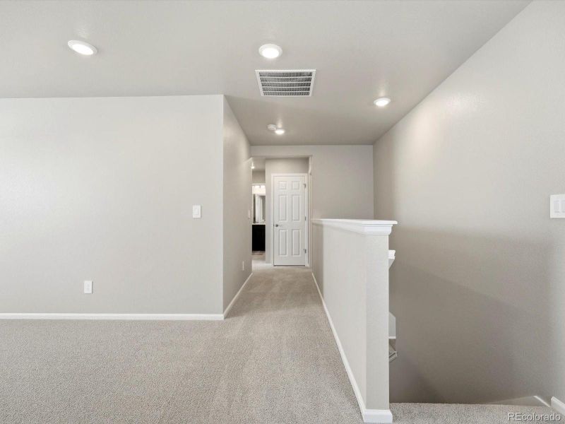 Spacious, unfurnished interior of a new home in Buffalo Highlands: The Flora Collection, Commerce City (Image 24).