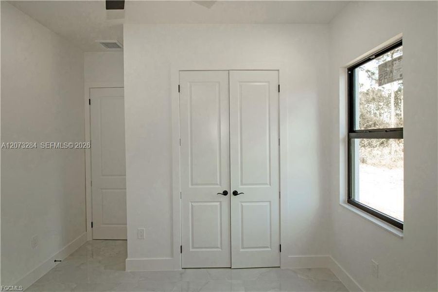 Spacious, unfurnished interior of a new home in , Lehigh Acres (Image 32).