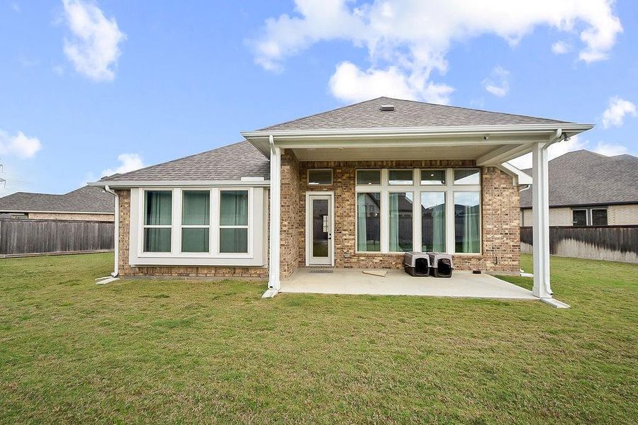 Large builder upgraded covered patio on oversized lot Large builder upgraded covered patio on oversized lot