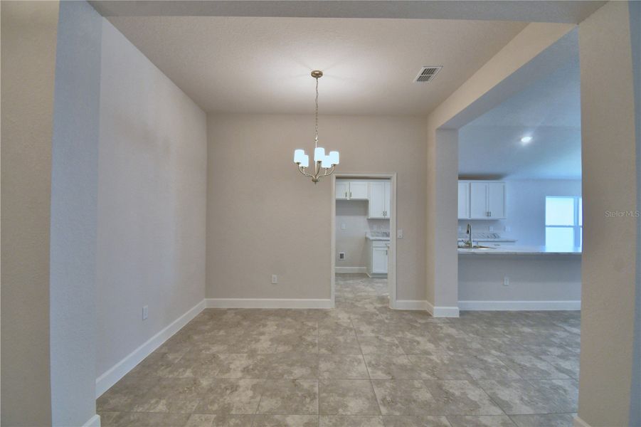 Spacious, unfurnished interior of a new home in Cadence Crossing, Auburndale (Image 13).