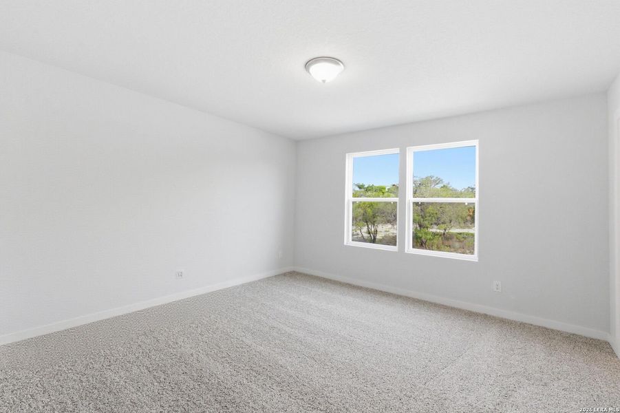 Spacious, unfurnished interior of a new home in The Meadows at Hunters Ranch, San Antonio (Image 32).