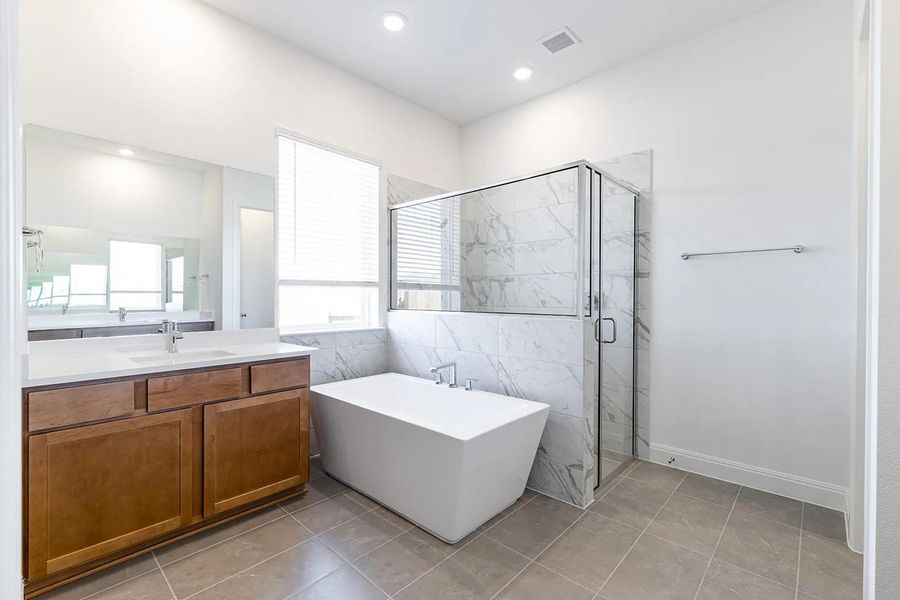 Furnished interior view inside a new home in The Colony - 50', Bastrop (Image 12).