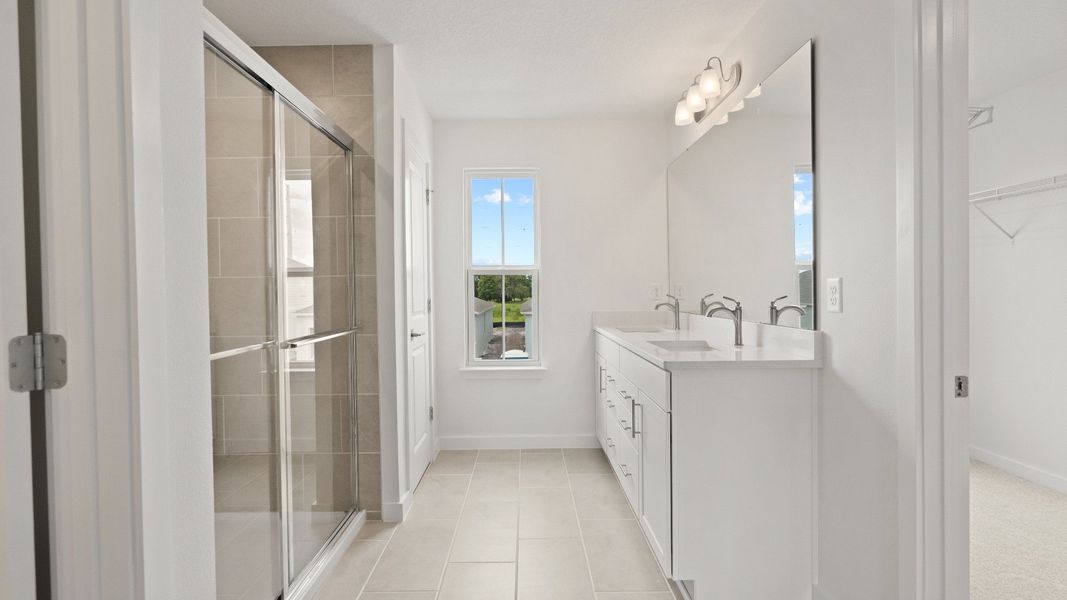 Highbourne Second Floor Primary en Suite Bath by DRB Homes in Willowbrook North located in Winter Haven, FL. Highbourne Second Floor Primary en Suite Bath by DRB Homes in Willowbrook North located in Winter Haven, FL.