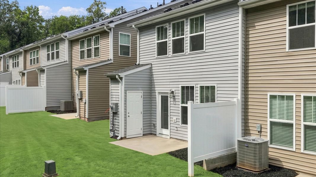 Eye-catching rear exterior with timeless color palette and superior architectural detail by DRB Homes Eye-catching rear exterior with timeless color palette and superior architectural detail by DRB Homes