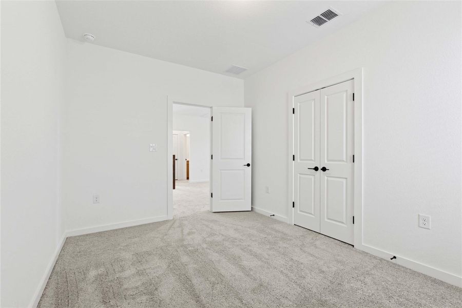 Spacious, unfurnished interior of a new home in Estancia West, Manchaca (Image 34). Spacious, unfurnished interior of a new home in Estancia West, Manchaca (Image 34).