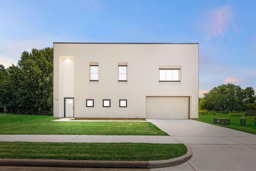 Front exterior of a new home in , Houston, TX, highlighting curb appeal (Image 24).