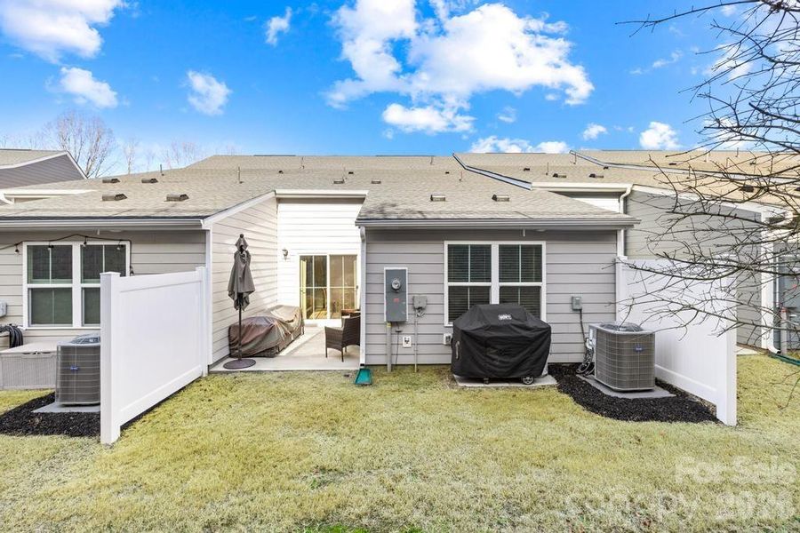 Exterior details and patio area of a home in , Troutman (Image 3).