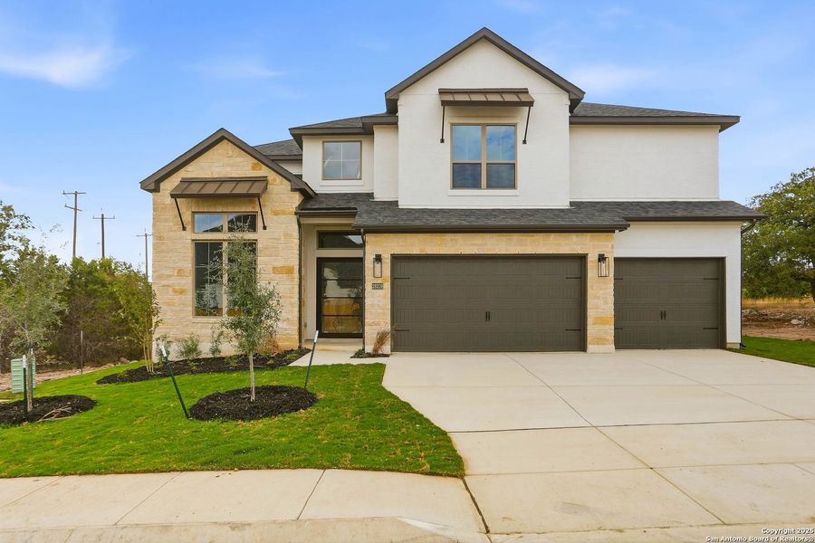 Front exterior of a new home in Kinder Ranch 70's, San Antonio, TX, highlighting curb appeal (Image 31).