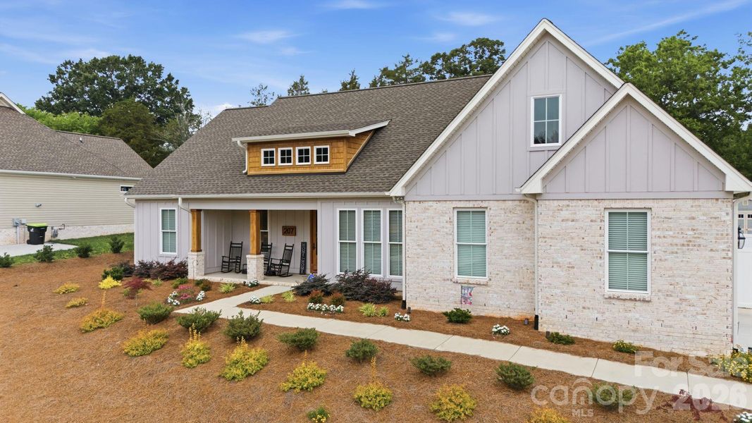 Front exterior of a new home in , Lexington, NC, highlighting curb appeal (Image 21).