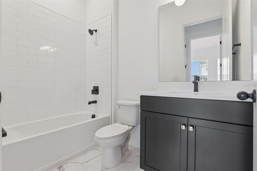 Furnished interior view inside a new home in Laureate Park (Craft Homes), Orlando (Image 6).