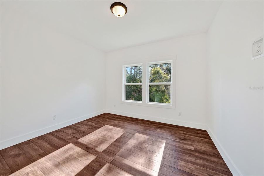 Spacious, unfurnished interior of a new home in , Port Charlotte (Image 15).