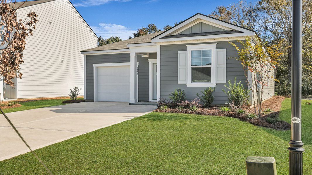 Exterior details and patio area of a home in The Oaks at Center Station, Hollywood (Image 22).