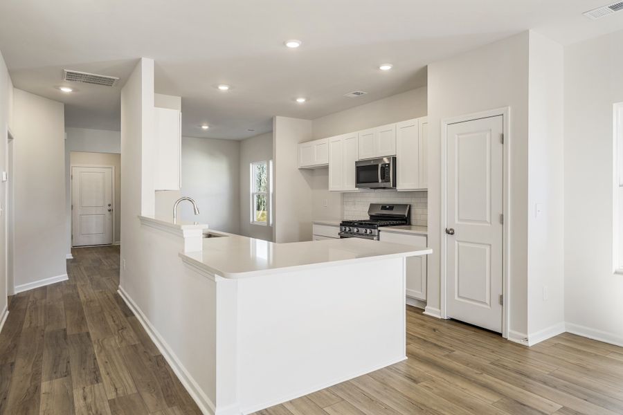 Furnished interior view inside a new home in Richmond Hill, Inman (Image 8).