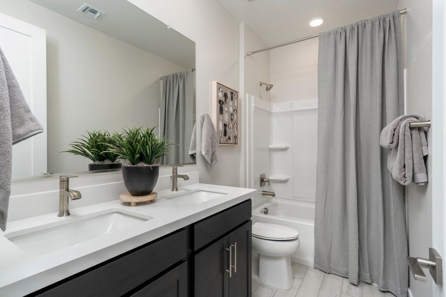 Representative furnished interior of a home built from the Monument by Risewell Homes in Citrus Park, Goodyear (Image 19).