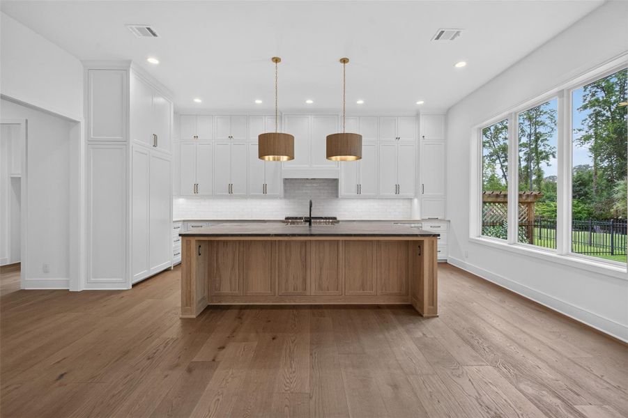 Furnished interior view inside a new home in , The Woodlands (Image 13).
