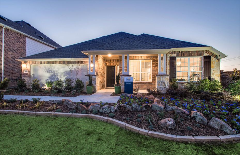 The Dunlay, a one-story home with 2-Car Garage, shown with Home Exterior D