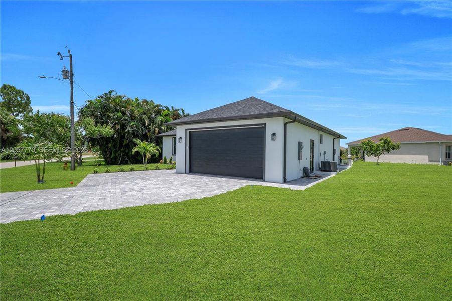 Front exterior of a new home in , Cape Coral, FL, highlighting curb appeal (Image 17).