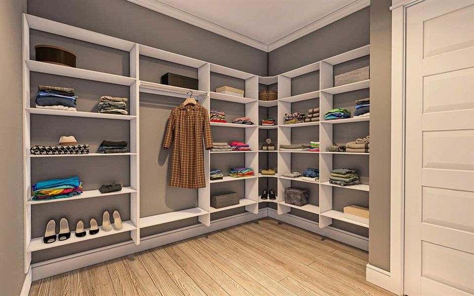 Spacious closet with light wood finished floors Spacious closet with light wood finished floors