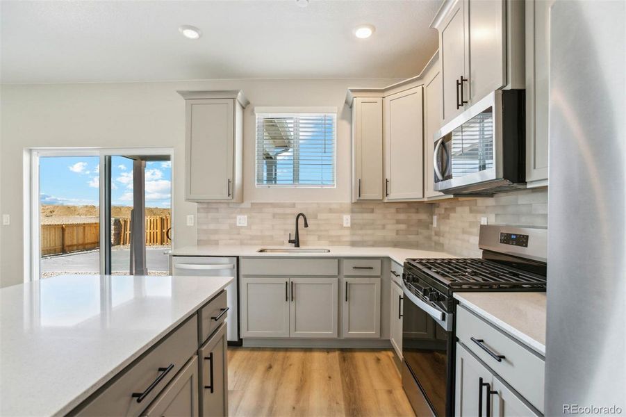 Furnished interior view inside a new home in Second Creek Farm, Commerce City (Image 6).