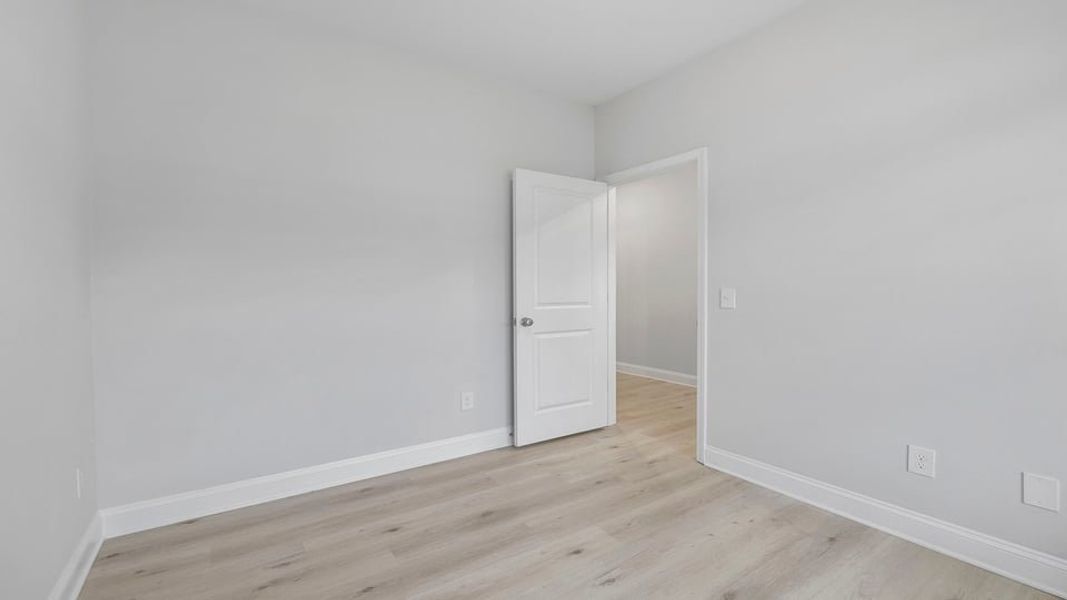 Spacious, unfurnished interior of a new home in Rutledge Estates, Woodruff (Image 16).