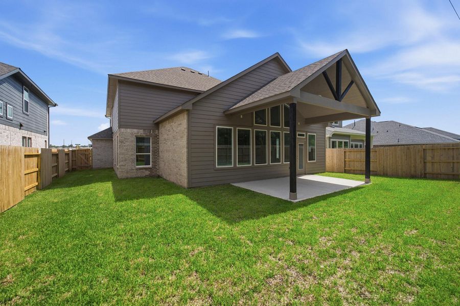 Exterior details and patio area of a home in Sundance Cove, Crosby (Image 21). Exterior details and patio area of a home in Sundance Cove, Crosby (Image 21).