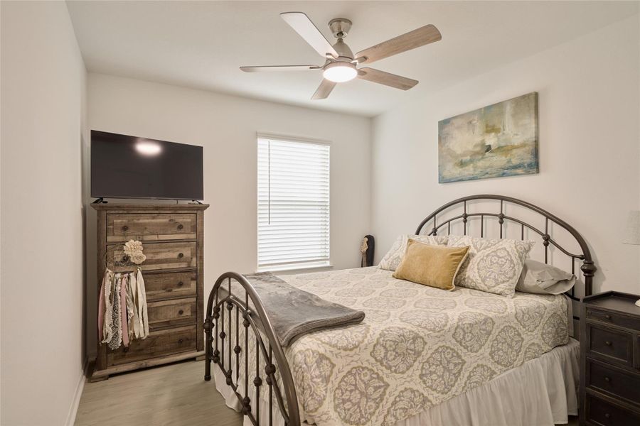 Furnished interior view inside a new home in The Pines At Seven Coves, Willis (Image 18).