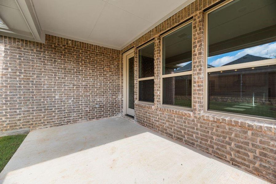 Exterior details and patio area of a home in Spiritas Ranch, Little Elm (Image 3). Exterior details and patio area of a home in Spiritas Ranch, Little Elm (Image 3).