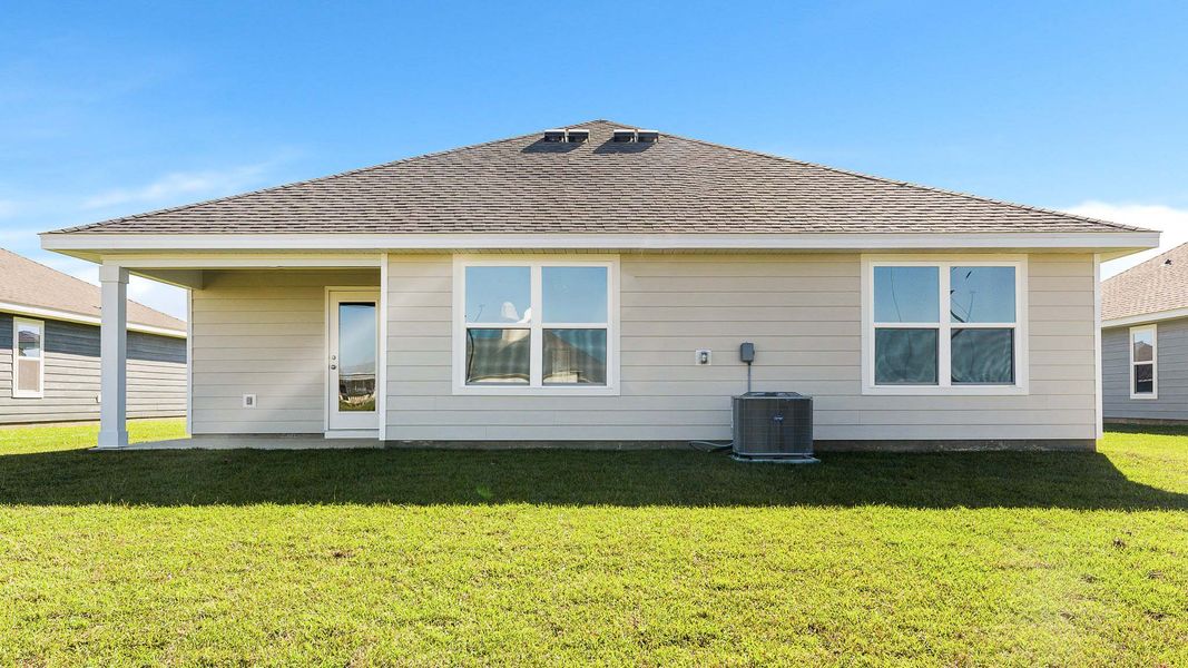 Front exterior of a new home in Liberty, Panama City, FL, highlighting curb appeal (Image 17).
