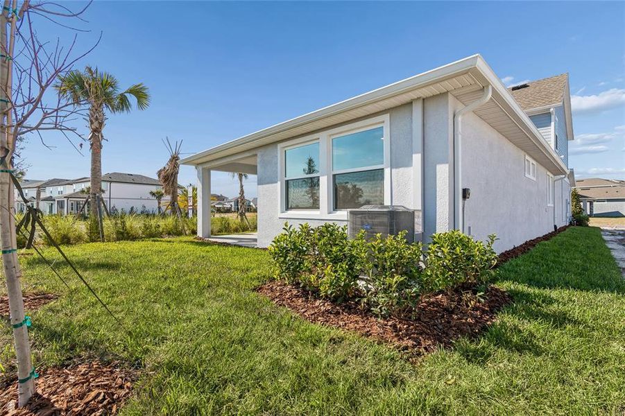 Exterior details and patio area of a home in Chapel Crossings - Garden Series, Wesley Chapel (Image 2). Exterior details and patio area of a home in Chapel Crossings - Garden Series, Wesley Chapel (Image 2).