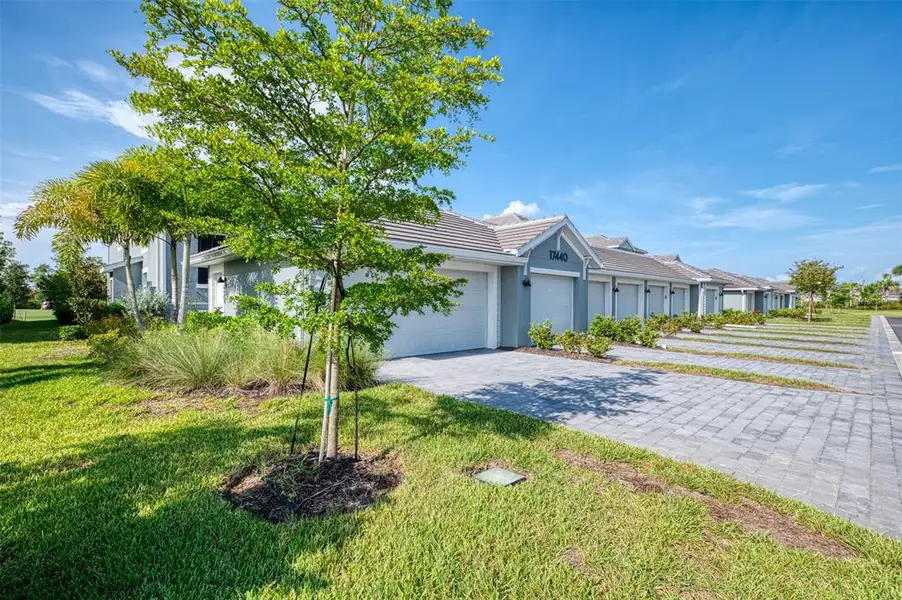 Front exterior of a new home in , Venice, FL, highlighting curb appeal (Image 23). Front exterior of a new home in , Venice, FL, highlighting curb appeal (Image 23).