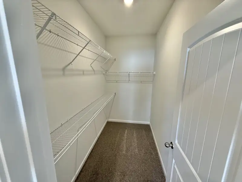 Spacious, unfurnished interior of a new home in Stone Fort Meadows, Manchester (Image 9).