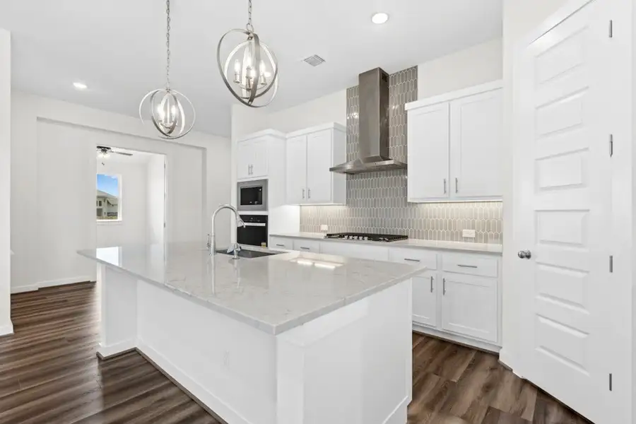 Furnished interior view inside a new home in University Heights, Round Rock (Image 7).