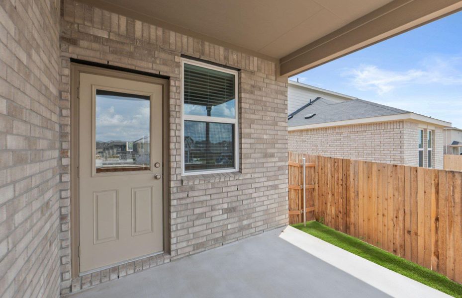 Exterior details and patio area of a home in Sunfield, Buda (Image 19).
