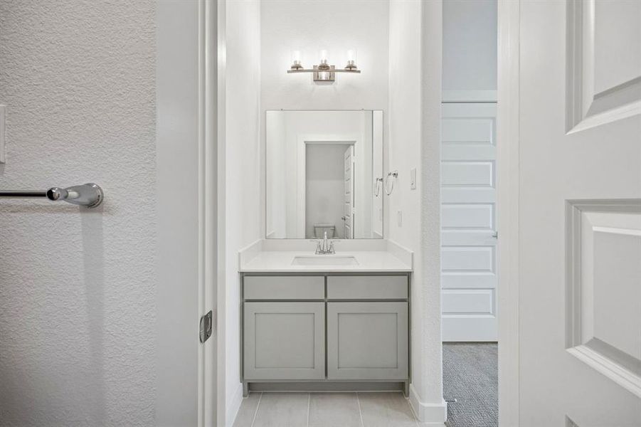 Bathroom in the Gilmour II home plan by Trophy Signature Homes – REPRESENTATIVE PHOTO