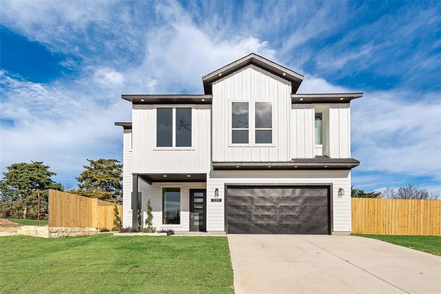 Front exterior of a new home in , Dallas, TX, highlighting curb appeal (Image 26).