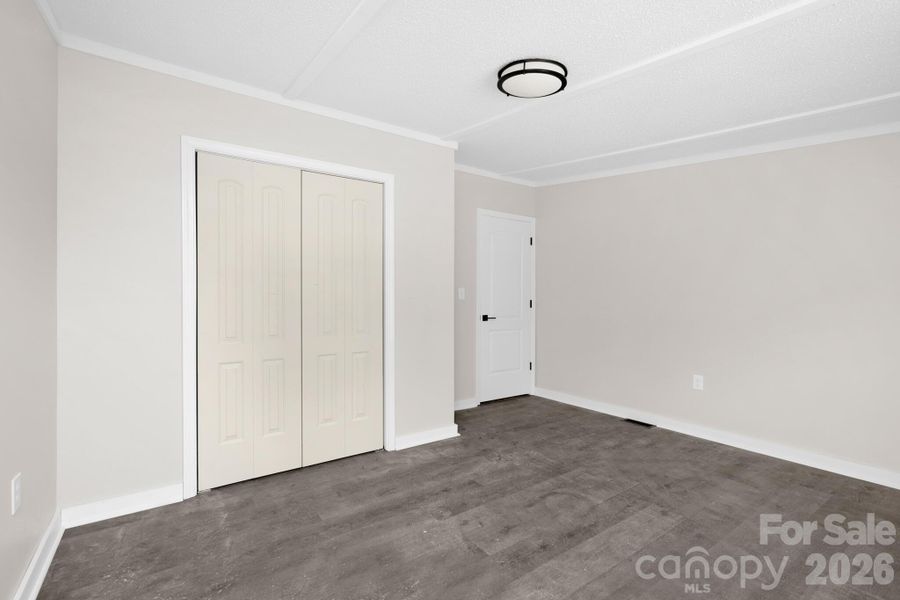 Spacious, unfurnished interior of a new home in , Vale (Image 16).
