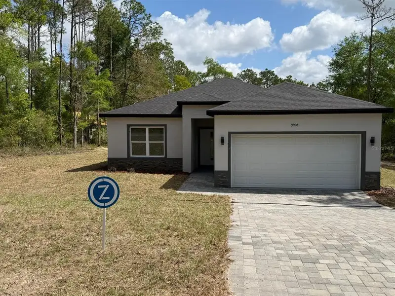Front exterior of a new home in , Dunnellon, FL, highlighting curb appeal (Image 1). Front exterior of a new home in , Dunnellon, FL, highlighting curb appeal (Image 1).