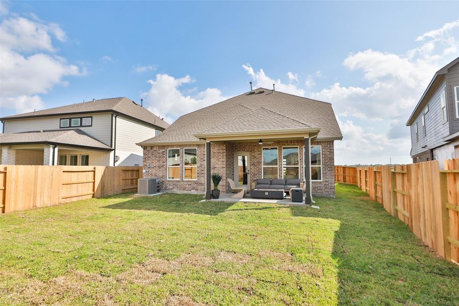 Exterior details and patio area of a home in River Ranch, Dayton (Image 3).