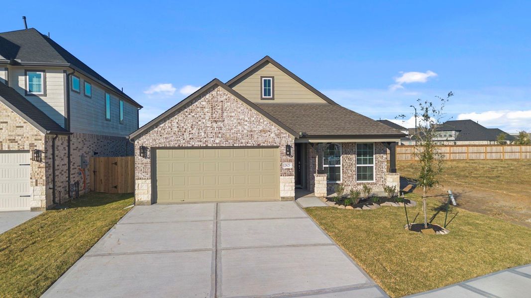 Front exterior of a new home in Morton Creek Ranch, Katy, TX, highlighting curb appeal (Image 14).