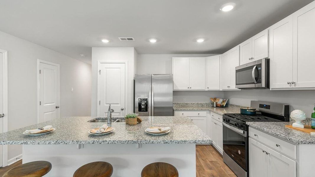 Furnished interior view inside a new home in Pine Hills Townhomes at Cane Bay, Summerville (Image 21).