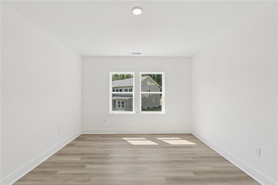Spacious, unfurnished interior of a new home in Settingdown Farms, Cumming (Image 21).