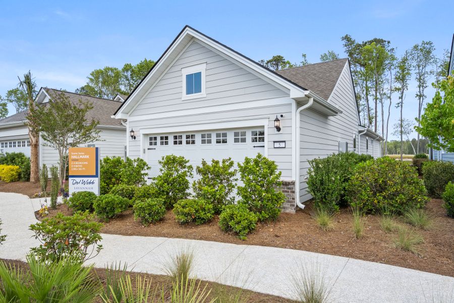 Front exterior of a new home in Del Webb Savannah at Heartwood, Richmond Hill, GA, highlighting curb appeal (Image 24). Front exterior of a new home in Del Webb Savannah at Heartwood, Richmond Hill, GA, highlighting curb appeal (Image 24).