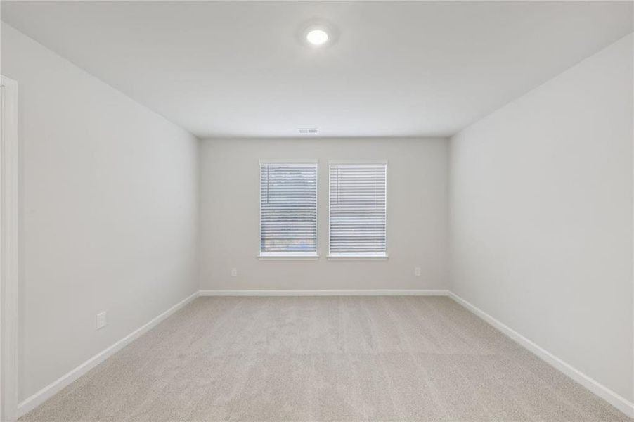 Spacious, unfurnished interior of a new home in Westmont Preserve, Powder Springs (Image 21).