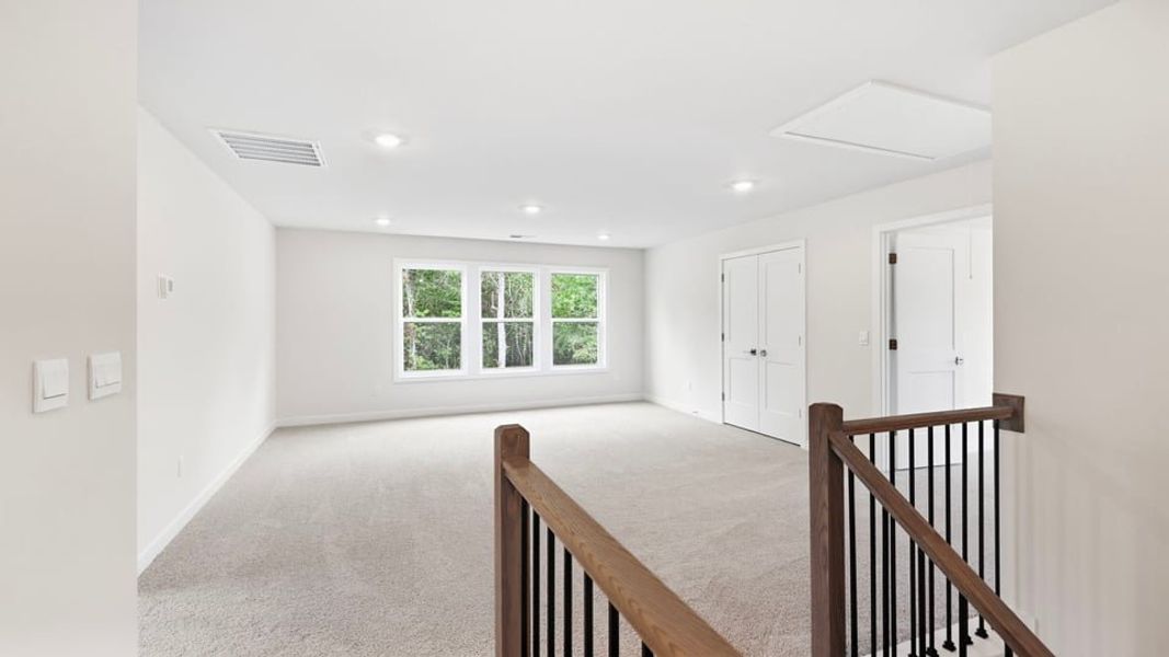 Spacious, unfurnished interior of a new home in Adams Glen, Greenville (Image 31).