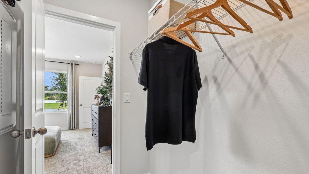 Flagler Floor Plan Primary Suite walk-in closet by DRB Homes in Willowbrook North New Homes in Winter Haven Florida Flagler Floor Plan Primary Suite walk-in closet by DRB Homes in Willowbrook North New Homes in Winter Haven Florida