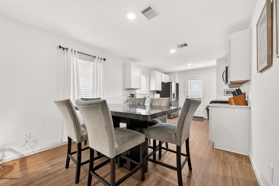 The dining room flows into the kitchen, with enough space for the perfect dining set to separate the kitchen it from the living room. The dining room flows into the kitchen, with enough space for the perfect dining set to separate the kitchen it from the living room.