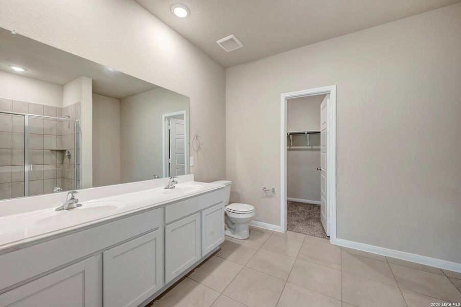 Furnished interior view inside a new home in Agave, San Antonio (Image 11).