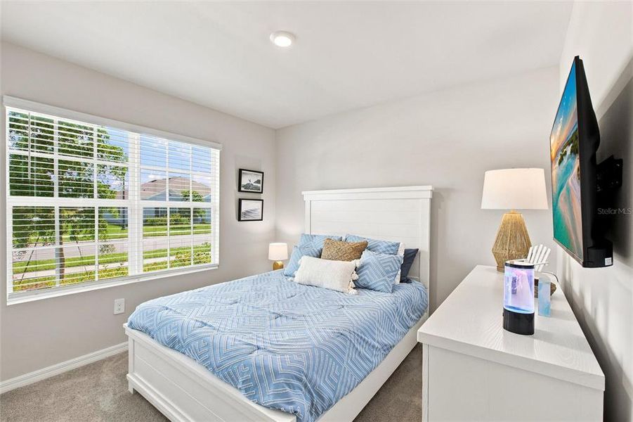 Furnished interior view inside a new home in Central Parc, North Port (Image 8). Furnished interior view inside a new home in Central Parc, North Port (Image 8).